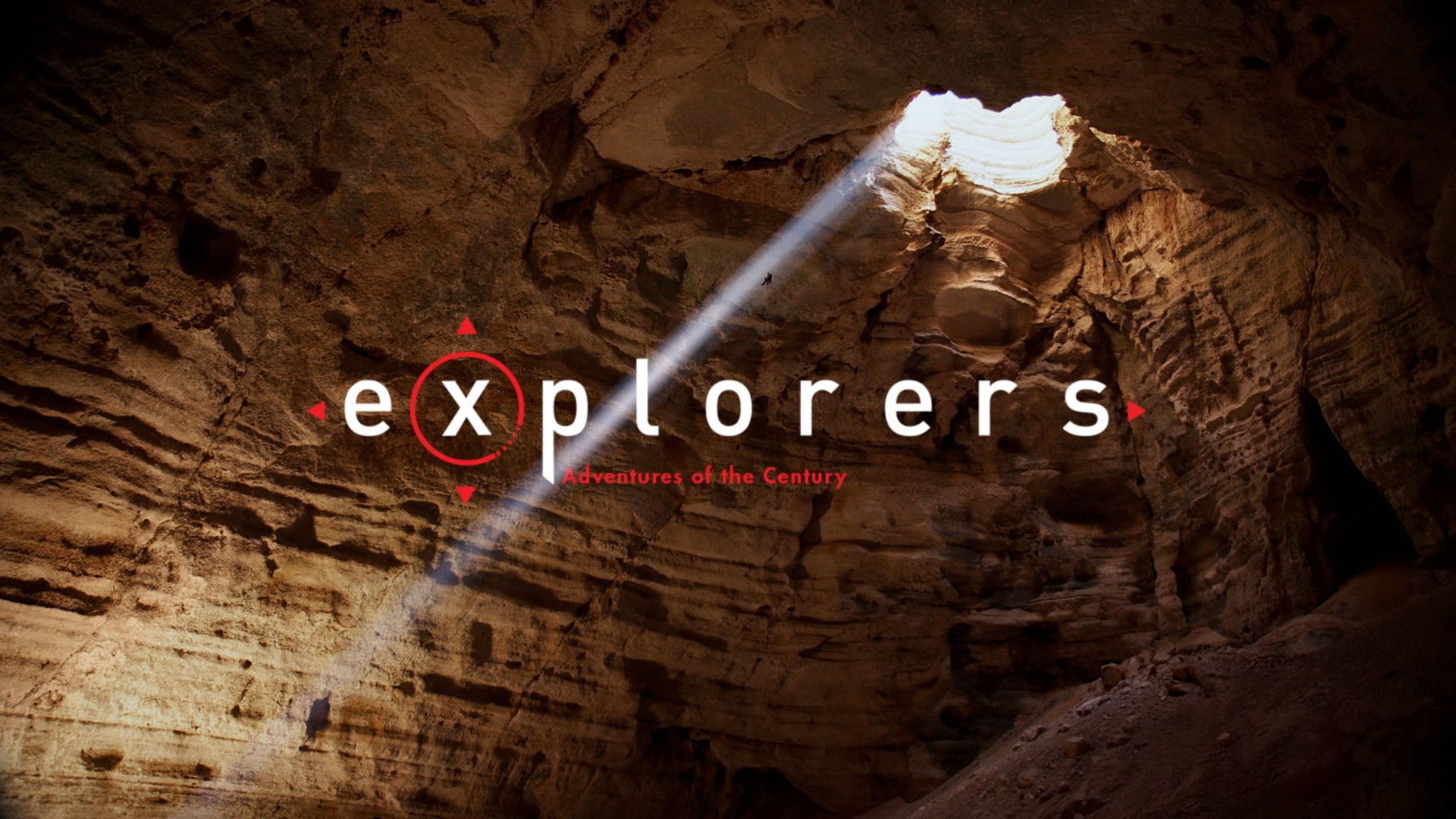 Sonnenstrahlen in einer Höhle, Logo "explorers"
